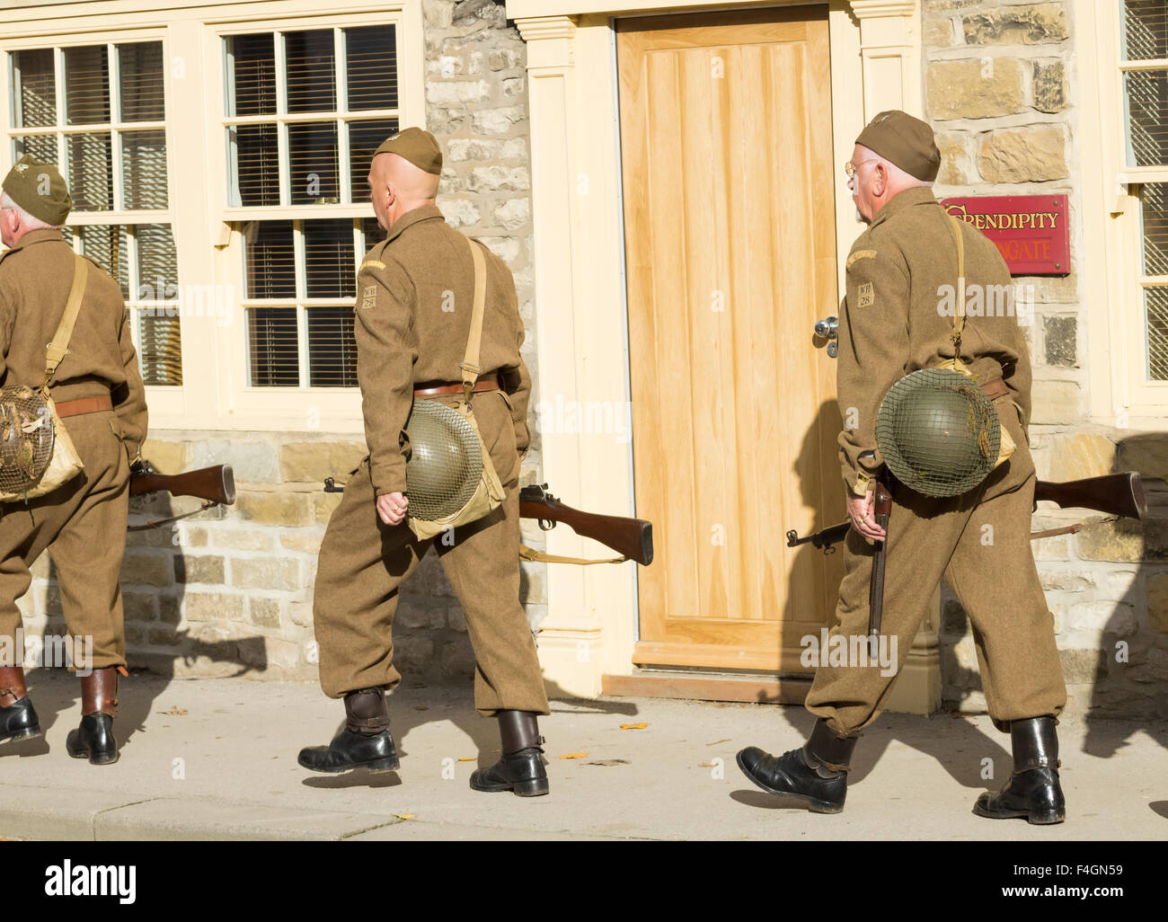 Pickering, North Yorkshire, UK. 17th October, 2015. Pickering`s annual Wartime and 40`s Weekend attracts thousands, with World War 2 living history camps and battle re-enactments amomg the attractions. PICTURED: Home Guard marching through the town Stock Photo